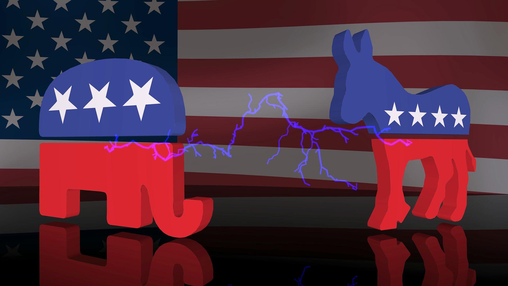 Símbolos dos partidos americanos nas cores azul e vermelho, conforme bandeira. À esquerda, o elefante e à direita, o cavalo.