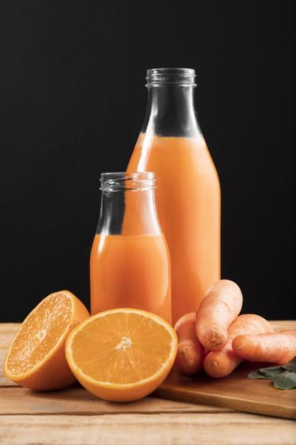 Smoothie de vista frontal com laranja e cenoura 23 2148555286